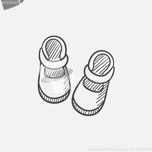 Image of Baby booties sketch icon.