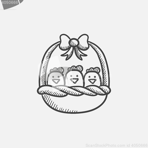 Image of Basket full of easter chicks sketch icon.