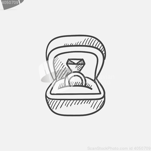 Image of Wedding ring in gift box sketch icon.