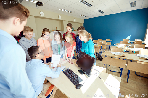 Image of group of students and teacher at school classroom