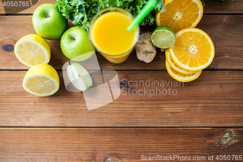 Image of glass of orange juice, fruits and vegetables