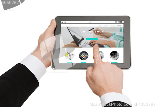 Image of close up of hands holding tablet pc with