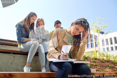 Image of student girl suffering of classmates mockery