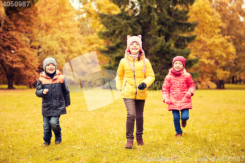 Image of group of happy little kids running outdoors