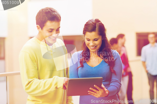 Image of group of smiling students tablet pc computer