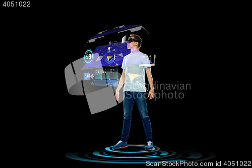 Image of happy man in virtual reality headset or 3d glasses