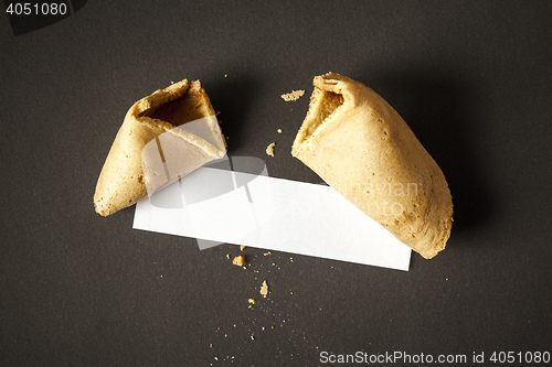 Image of a fortune cookie with a blank paper for your message