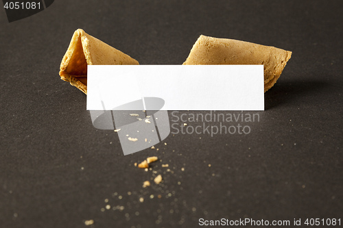 Image of a fortune cookie with a blank paper for your message