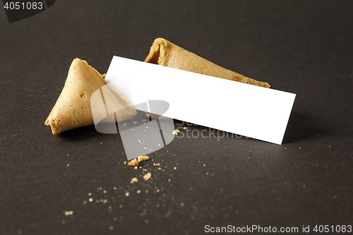 Image of a fortune cookie with a blank paper for your message