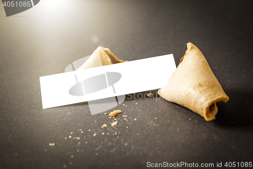 Image of a fortune cookie with a blank paper for your message