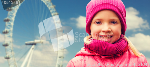 Image of happy little girl portrait over ferry wheel