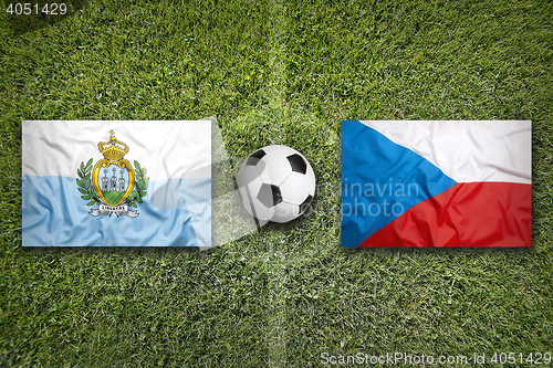 Image of San Marino vs. Czech Republic flags on soccer field