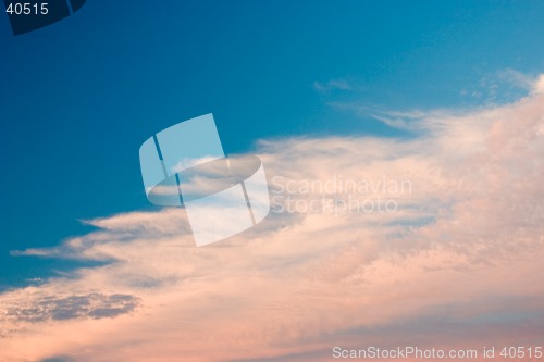 Image of Yellow and orange clouds on blue sky