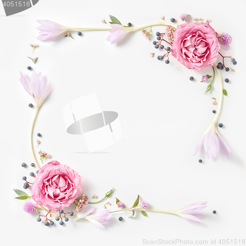 Image of Fresh pink roses frame border isolated