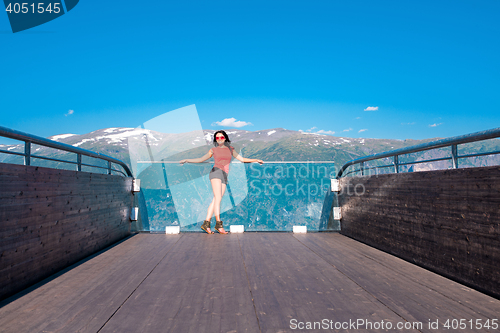 Image of Woman enjoying scenics from Stegastein Viewpoint