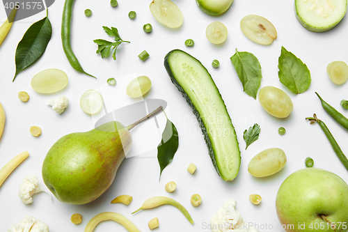 Image of Composition with fresh vegetables and fruits on a white background