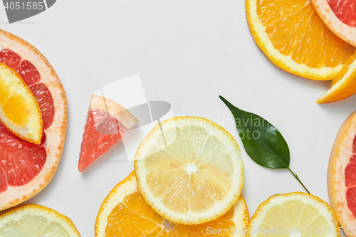 Image of Close up of fresh orange, grapefruit, lime and lemon slices