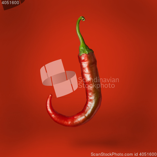 Image of Hot chilli pepper floating over