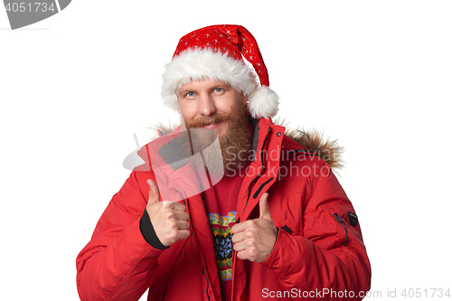 Image of bright picture of handsome man in christmas hat.
