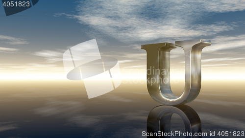 Image of metal uppercase letter u under cloudy sky - 3d rendering