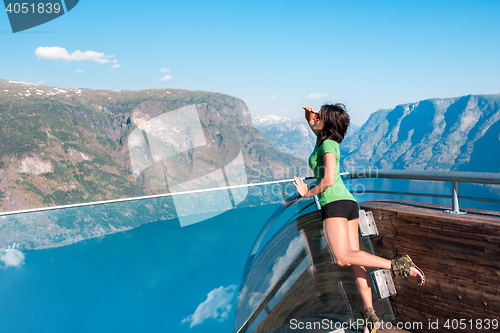 Image of Woman enjoying scenics from Stegastein Viewpoint