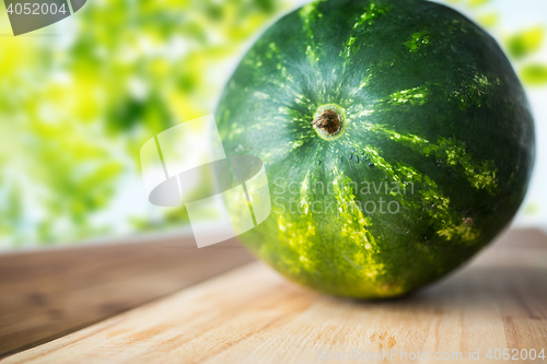 Image of close up of watermelon on cutting board