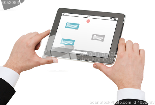 Image of close up of hands holding tablet pc with messenger