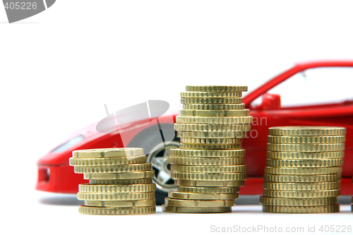 Image of coins and red car