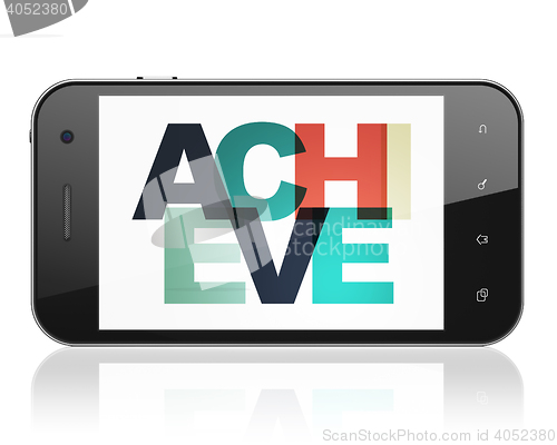Image of Finance concept: Smartphone with Achieve on  display