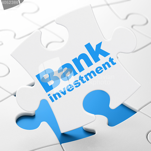 Image of Money concept: Bank Investment on puzzle background