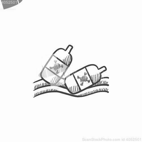 Image of Bottles floating in water sketch icon.