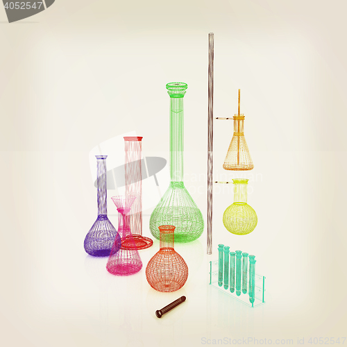 Image of Chemistry set, with test tubes, and beakers filled with colored 