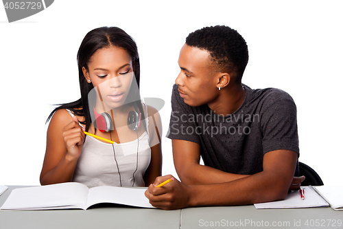 Image of Students helping studying together