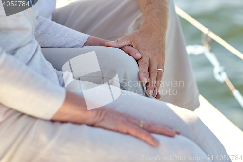 Image of close up of senior couple on sail boat or yacht