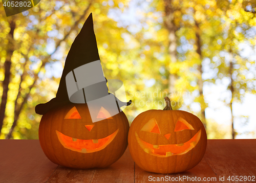 Image of close up of pumpkins on table outdoors