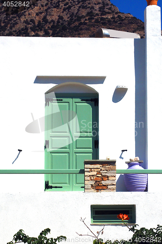 Image of Greek Island white Cyclades architecture of guest house  wooden 