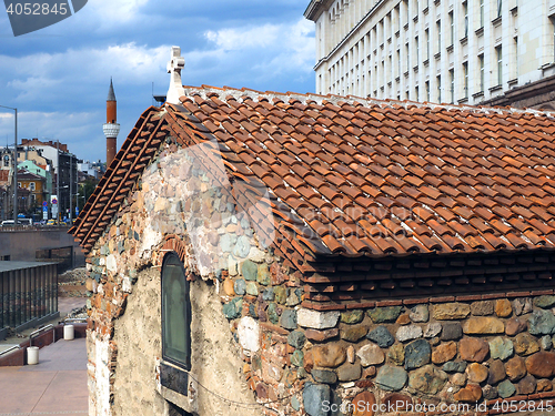 Image of historic church with mosque in background Sofia Bulgaria Europe