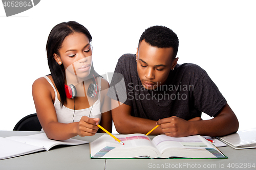 Image of Students helping studying together