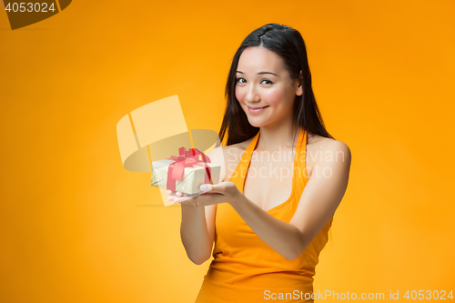 Image of Chinese girl with a gift