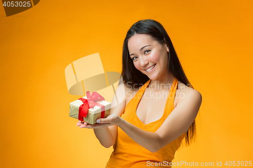 Image of Chinese girl with a gift