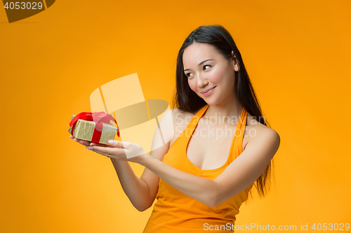 Image of Chinese girl with a gift