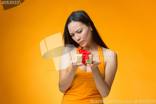 Image of Chinese girl with a gift