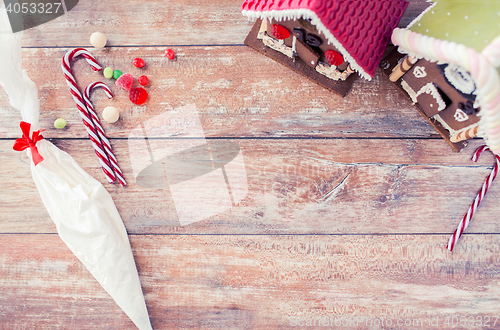 Image of closeup of beautiful gingerbread houses at home