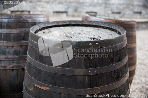 Image of close up of old wooden barrel outdoors