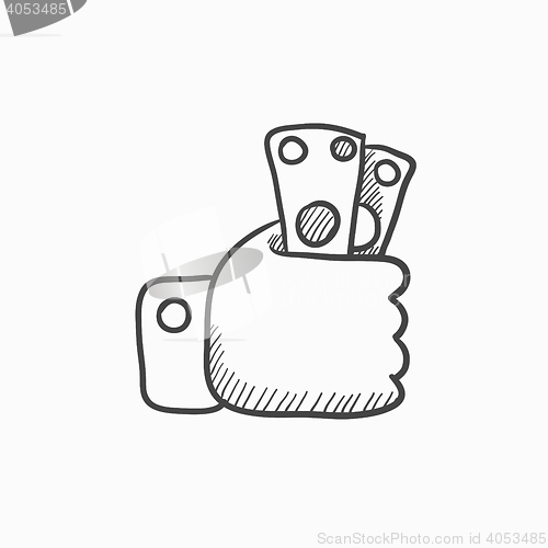 Image of Hand holding money sketch icon.