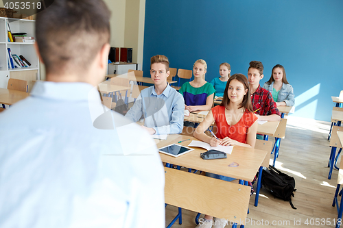 Image of group of students and teacher at school lesson