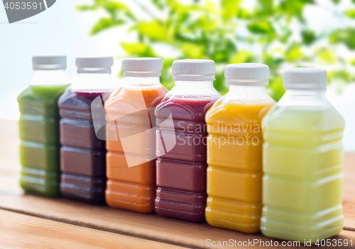 Image of bottles with different fruit or vegetable juices