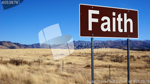 Image of Faith brown road sign