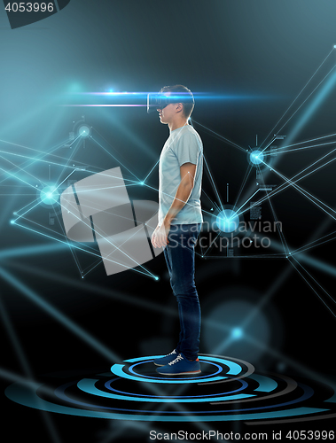 Image of happy man in virtual reality headset or 3d glasses