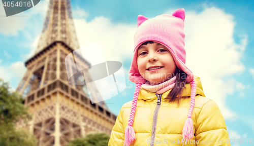 Image of happy little girl over eiffel tower in paris